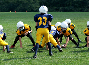 person playing football with goggles