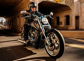 person riding motorcycle with goggles