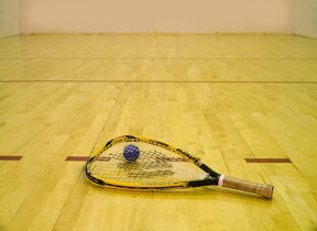 person playing racquetball with goggles